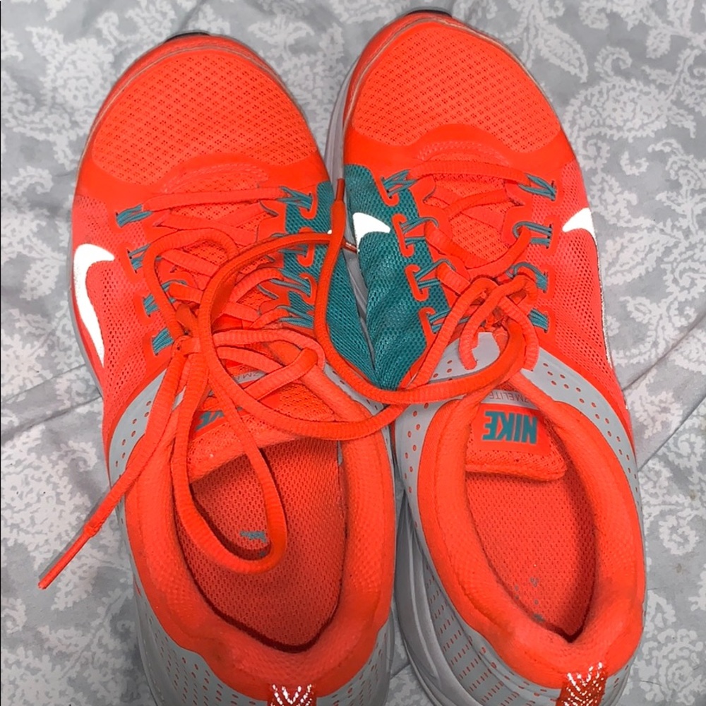 Neon reflective nikes